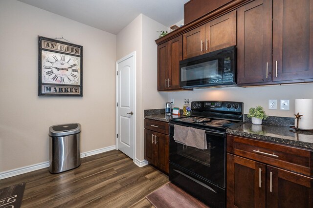 kitchen with black appliances, dark hardwood / wood-style flooring, dark brown cabinets, and dark stone counters