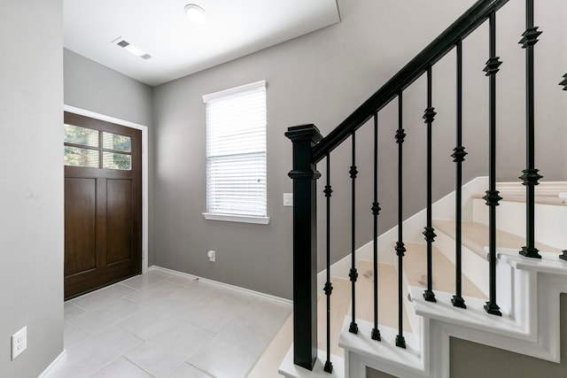 view of tiled entrance foyer