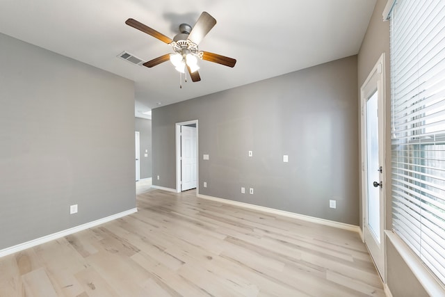 spare room with ceiling fan and light hardwood / wood-style flooring