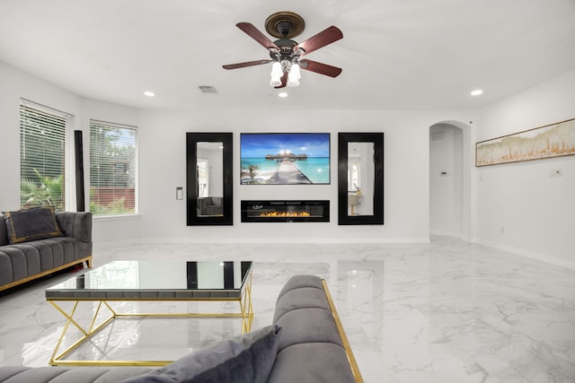 living room with ceiling fan