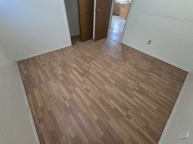 empty room featuring dark hardwood / wood-style floors