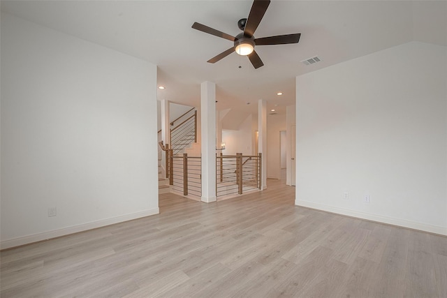 spare room featuring ceiling fan and light hardwood / wood-style flooring