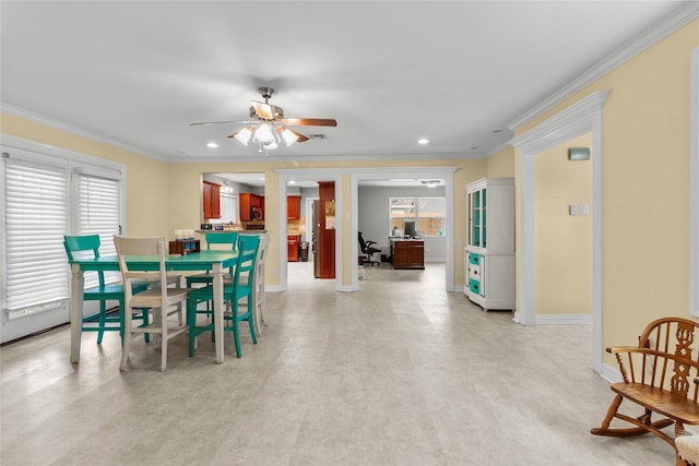 dining room with recessed lighting, baseboards, a ceiling fan, and ornamental molding