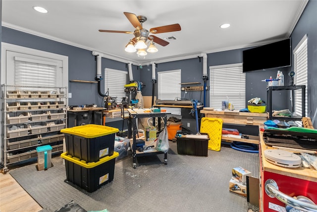 interior space with crown molding, recessed lighting, a ceiling fan, and visible vents