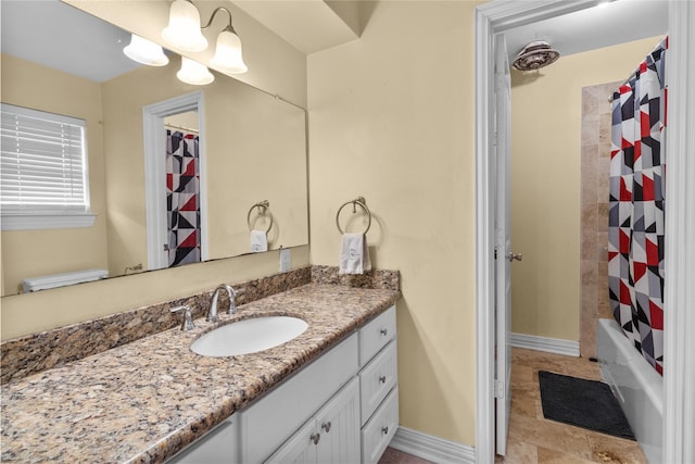 2602 Gerol Ct, Galveston, TX 77551 - bathroom featuring shower / bath combination with curtain, baseboards, and vanity