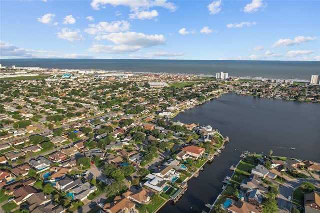 aerial view with a water view and a residential view