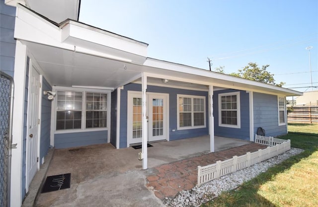 rear view of property featuring a patio