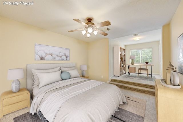 bedroom with carpet floors and ceiling fan