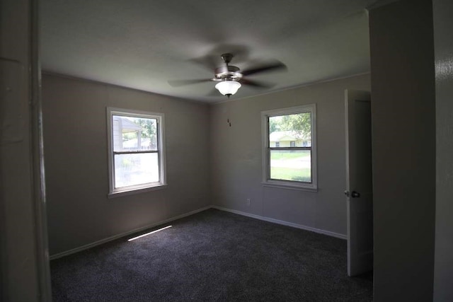 carpeted empty room with ceiling fan