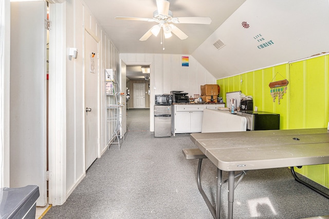 kitchen with lofted ceiling and ceiling fan