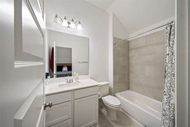 full bathroom with tile patterned floors, vaulted ceiling, shower / bath combo, toilet, and vanity