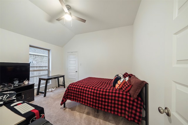 bedroom featuring light colored carpet, ceiling fan, and vaulted ceiling