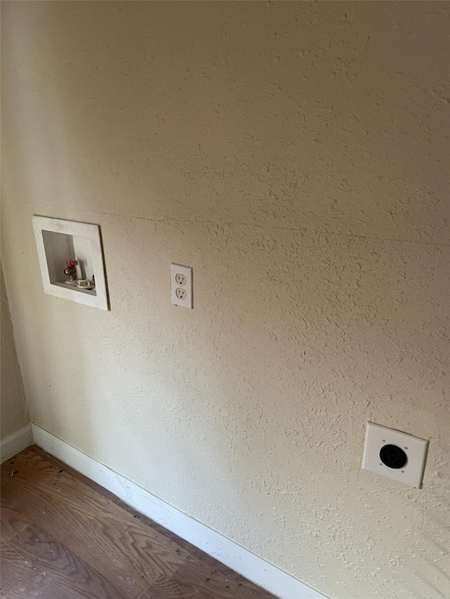 washroom featuring hookup for a washing machine and hardwood / wood-style flooring