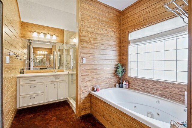 bathroom featuring vanity, wooden walls, and plus walk in shower