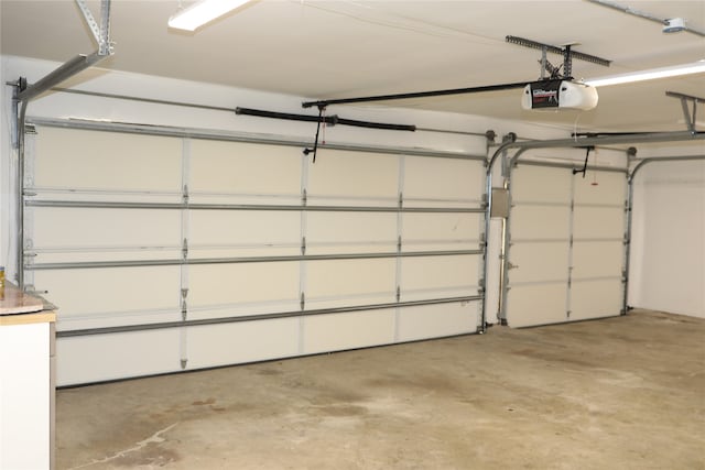 garage featuring a garage door opener