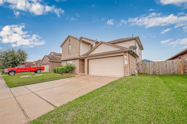 view of front of home with a garage and a front yard