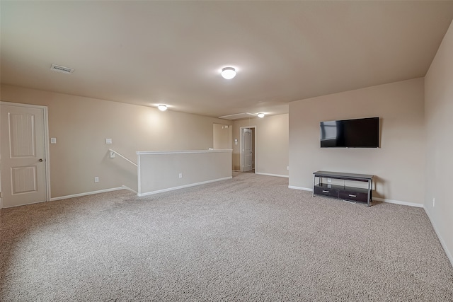 unfurnished living room with carpet flooring