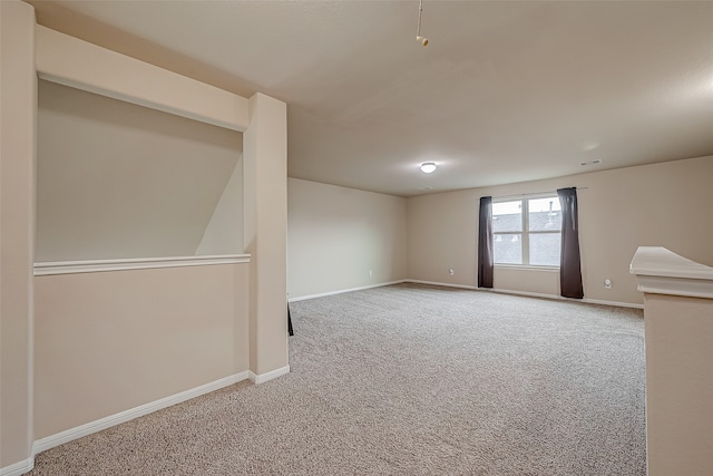 unfurnished room with carpet