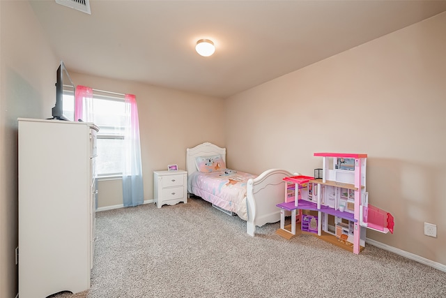 bedroom featuring carpet