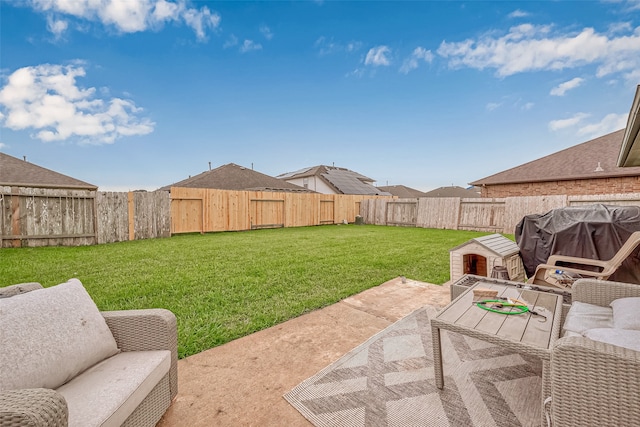 view of yard featuring a patio and an outdoor living space