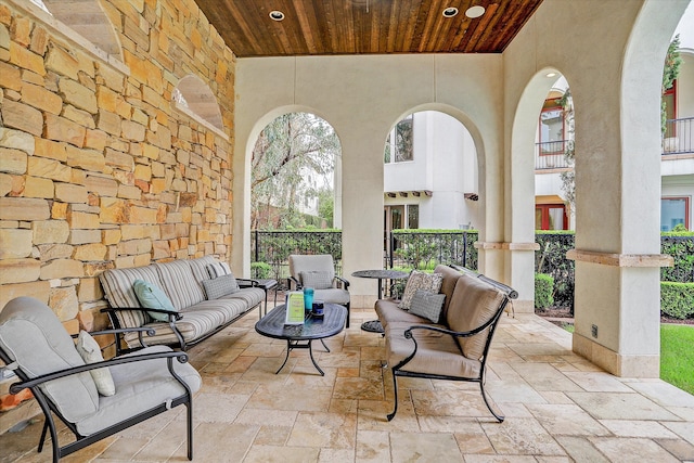 view of patio / terrace with outdoor lounge area and a balcony