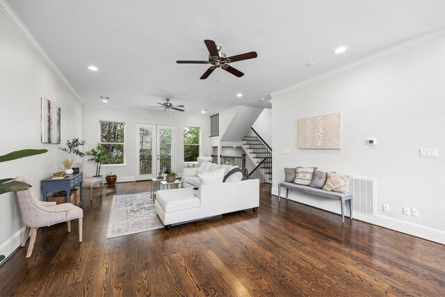 living room with french doors, ceiling fan, crown molding, and dark hardwood / wood-style floors