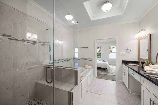 bathroom featuring independent shower and bath, crown molding, a raised ceiling, and vanity