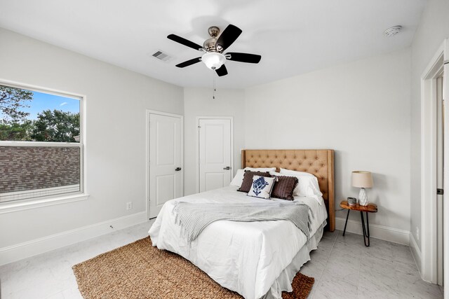 bedroom featuring ceiling fan