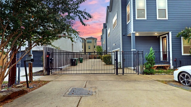 view of gate at dusk