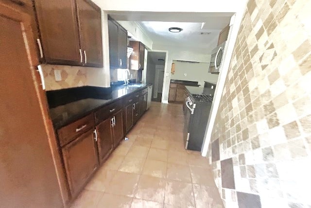 kitchen with gas stove and sink