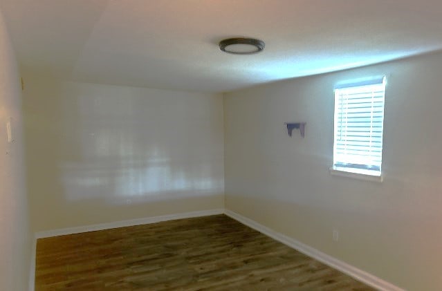 empty room featuring hardwood / wood-style floors