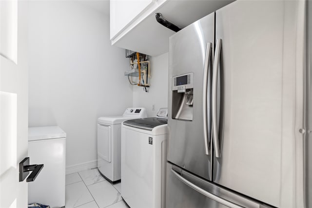 laundry room with washer and clothes dryer