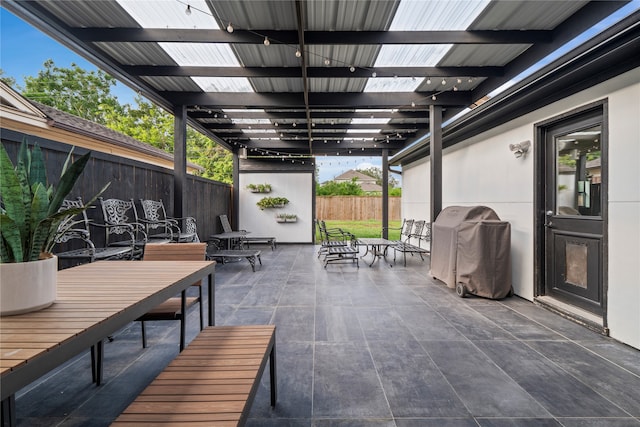 view of patio / terrace with a pergola and grilling area