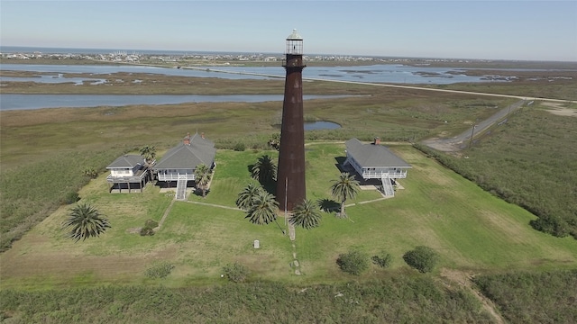 birds eye view of property featuring a rural view and a water view