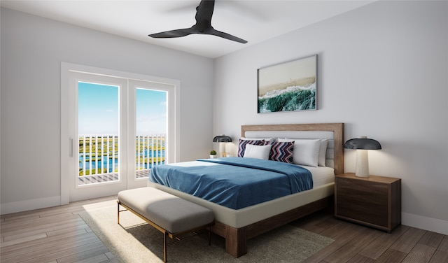 bedroom with ceiling fan, wood-type flooring, and access to outside