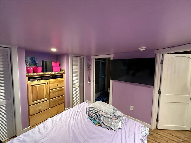 bedroom featuring light hardwood / wood-style floors