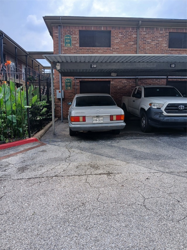 exterior space featuring a carport