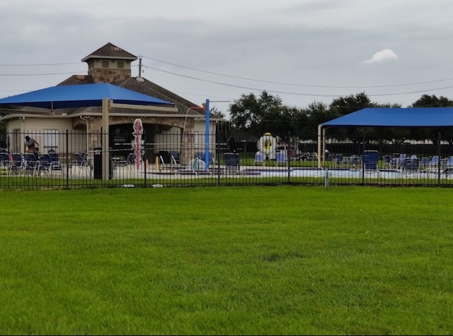 exterior space featuring a yard and a playground