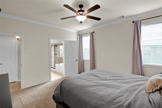 carpeted bedroom with connected bathroom, crown molding, and ceiling fan