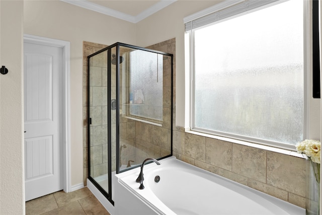 bathroom with ornamental molding, shower with separate bathtub, and tile patterned flooring