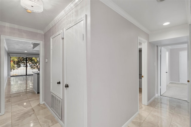 hallway featuring ornamental molding