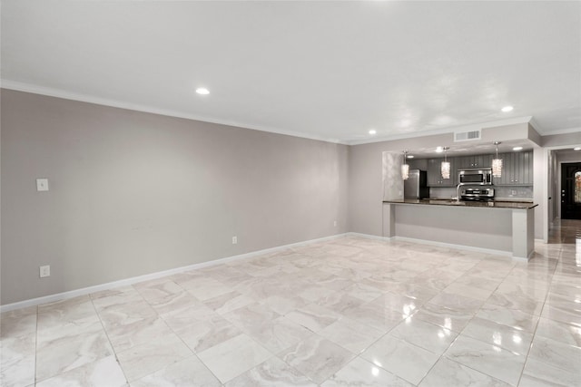 unfurnished living room with crown molding