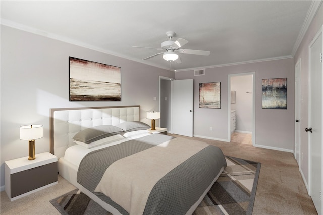 bedroom featuring light carpet, ceiling fan, ensuite bathroom, and ornamental molding