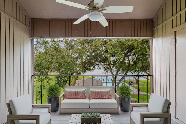 balcony featuring ceiling fan