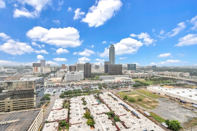 birds eye view of property featuring a city view