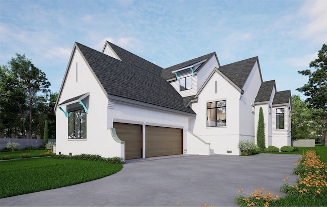 view of front of home featuring a garage and a front yard