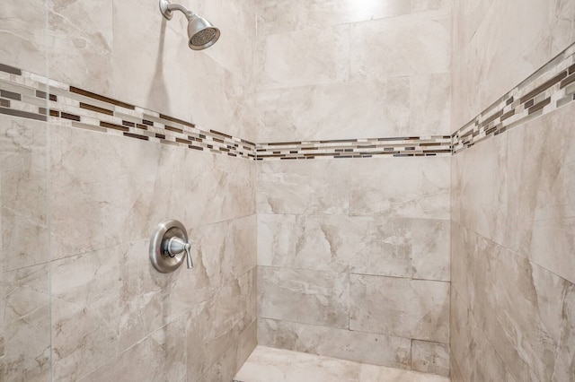 room details with a tile shower