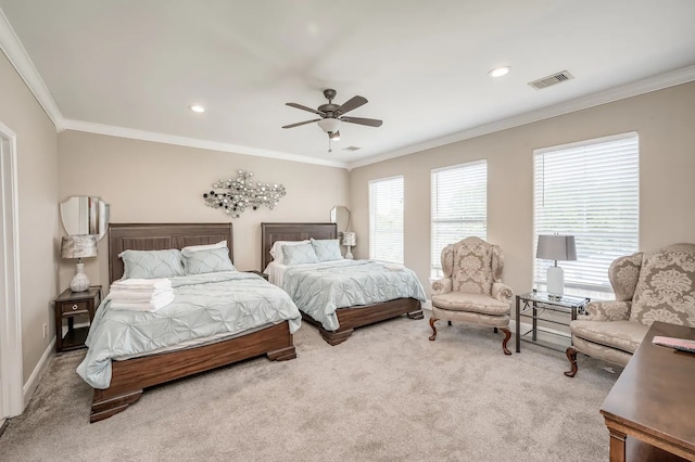 bedroom with ceiling fan, light colored carpet, and ornamental molding