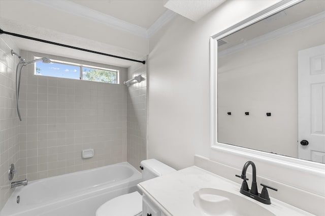 full bathroom featuring toilet, tiled shower / bath combo, ornamental molding, and vanity