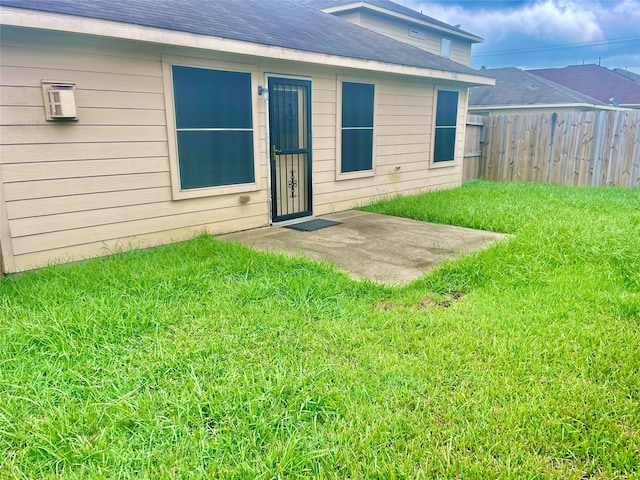 rear view of house with a lawn